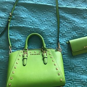 Michael Kors lime green purse and matching wallet.